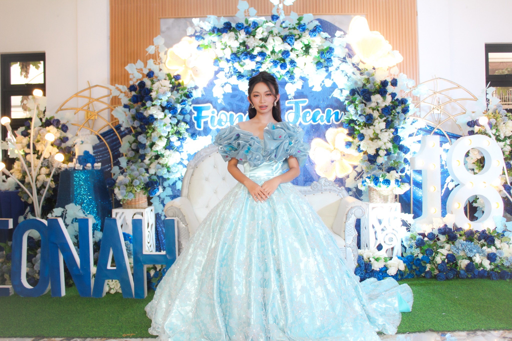 PND debut event photography featuring a celebrant in a blue gown